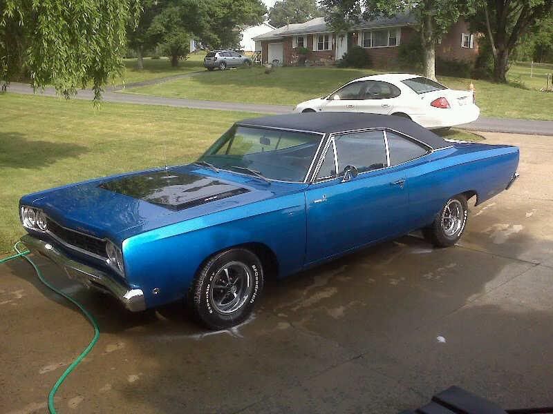 My girlfriend's dad's 68 Roadrunner He spent 8 years rebuilding it in his